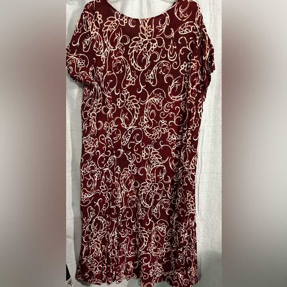 Woman Within. Maroon dress with white design